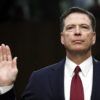 Former FBI Director James Comey is sworn in during the June 8 Senate Intelligence Committee hearing in Washington.