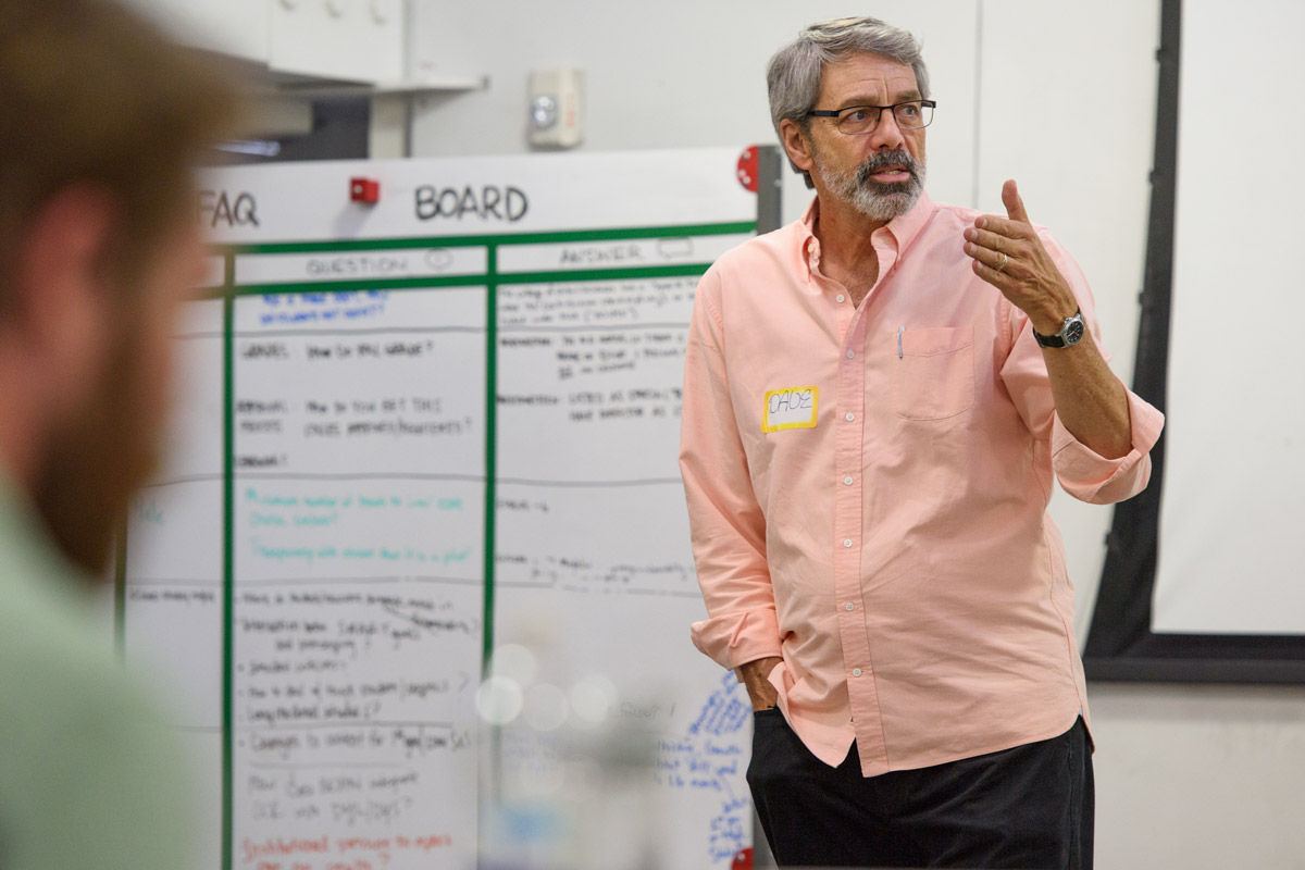 Dave Evans, a lecturer in the Department of Mechanical Engineering's Design Program, leads an exercise during the Life Design Studio.