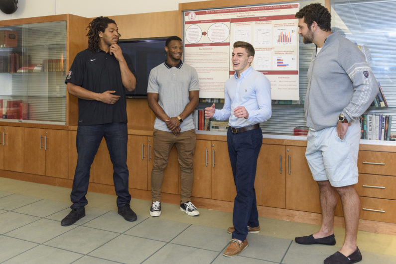 Peter Kalambayi, left, Terrence Alexander, Mason Pengilly, and Erik Lorig