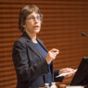 Debra Satz at a lectern