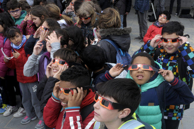 Children watching eclipse