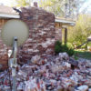 A fallen brick chimney of a house in Oklahoma after a magnitude 5.6 earthquake likely induced by injection into deep disposal wells in the Wilzetta North field; Nov. 6, 2011.