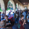 Grad students attend a resource fair in the Quad arcades sponsored by the office of the Vice Provost for Graduate Education as part of New Graduate Student Orientation.