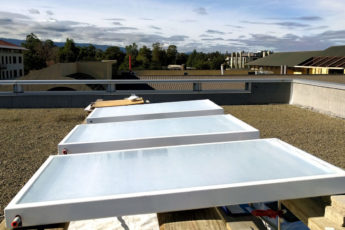 Fluid-cooling panels on the roof of Stanford building