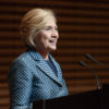 Hillary Clinton speaking at podium