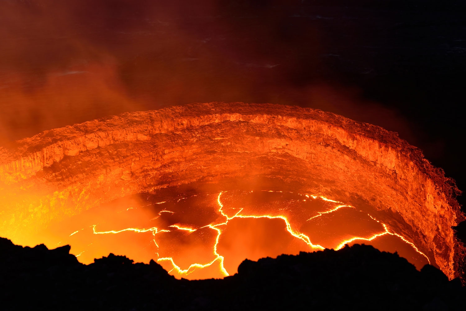 Inside view of an active volcano with lava flow at Hawaii Volcanoes National Park.