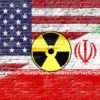 Iranian and U.S. flags with nuclear logo