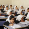 Young girls wearing head scarves attending school in Kandahar, Afghanistan.