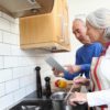 Elderly couple cooking