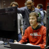 students in a videogame course play their game