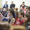 Students in the audience of the town hall.