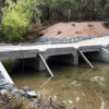 Roadway supported by box culverts that restored low flow and uninterrupted fish passage