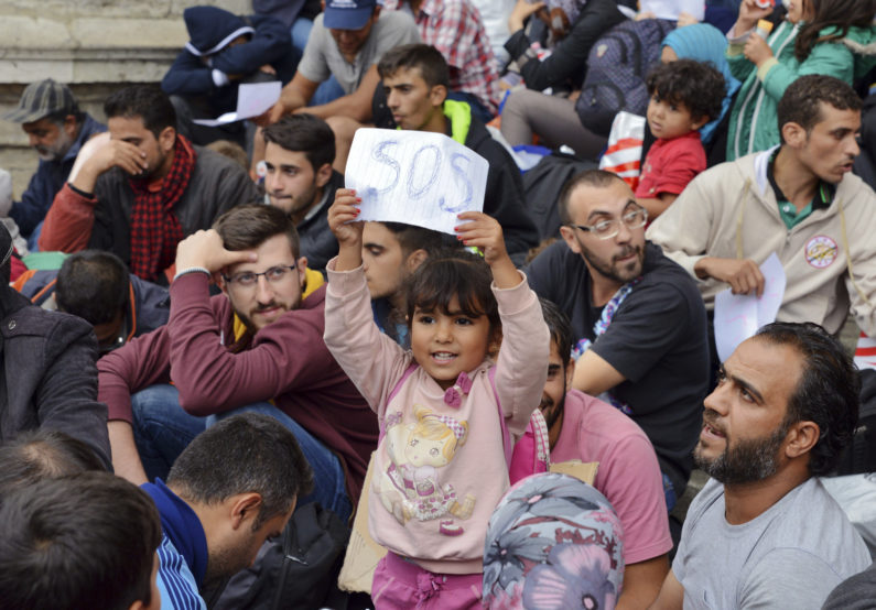 refugees at railway station in Hungary