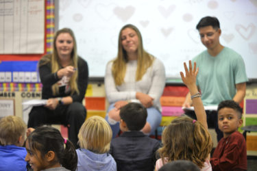 Kayler Detmer, left, Emily Delleman and Erick Siavichay