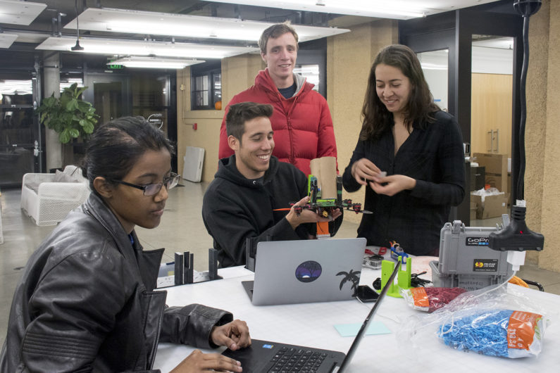 Students working on drone