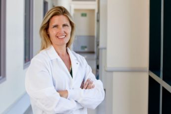 Image of Karen Parker in a white coat with arms crossed