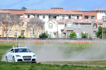 Autonomous car driving on a dirt track