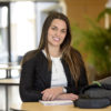 Danielle Maddix standing by a table