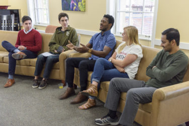 Five students speak as part of a multifaith panel