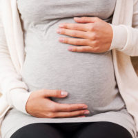 close up of a pregnant woman's abdomen