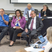 Robert Weisberg, Yvonne Maldonado and Matt Snipp at the faculty senate