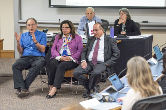 Robert Weisberg, Yvonne Maldonado and Matt Snipp at the faculty senate