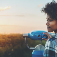 young woman looking off to horizon