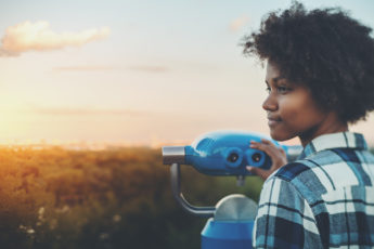 young woman looking off to horizon