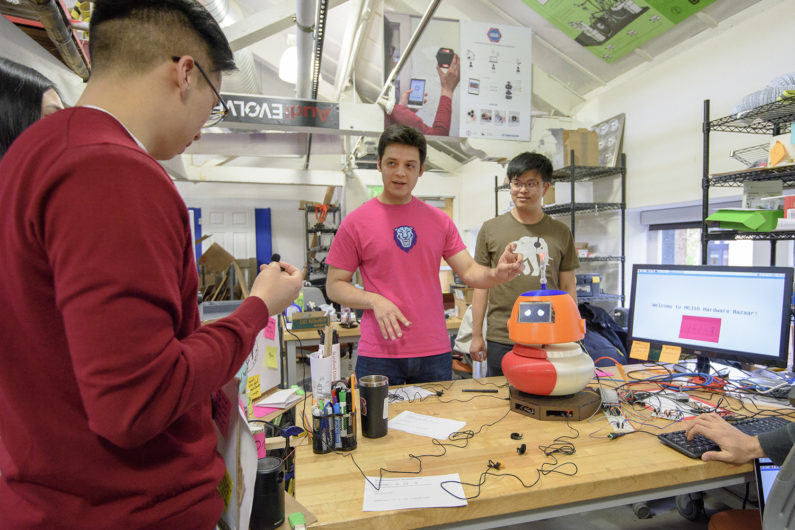 Graduate students Martin Perez and Ye Wang