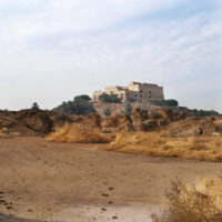 Saddam Hussein's Palace in Hillah, Iraq seen on the hill from within the ancient Babylon.