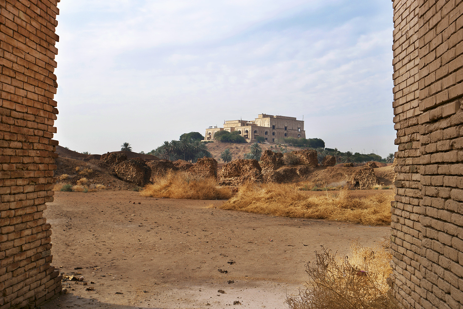 Saddam Hussein's Palace in Hillah, Iraq seen on the hill from within the ancient Babylon.