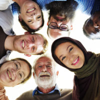 People of different ages and nationalities having fun together