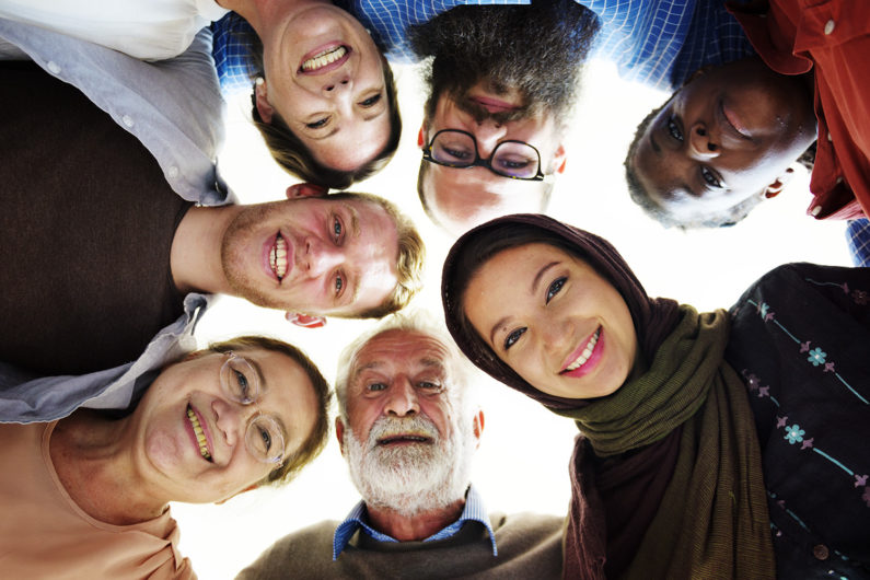 People of different ages and nationalities having fun together