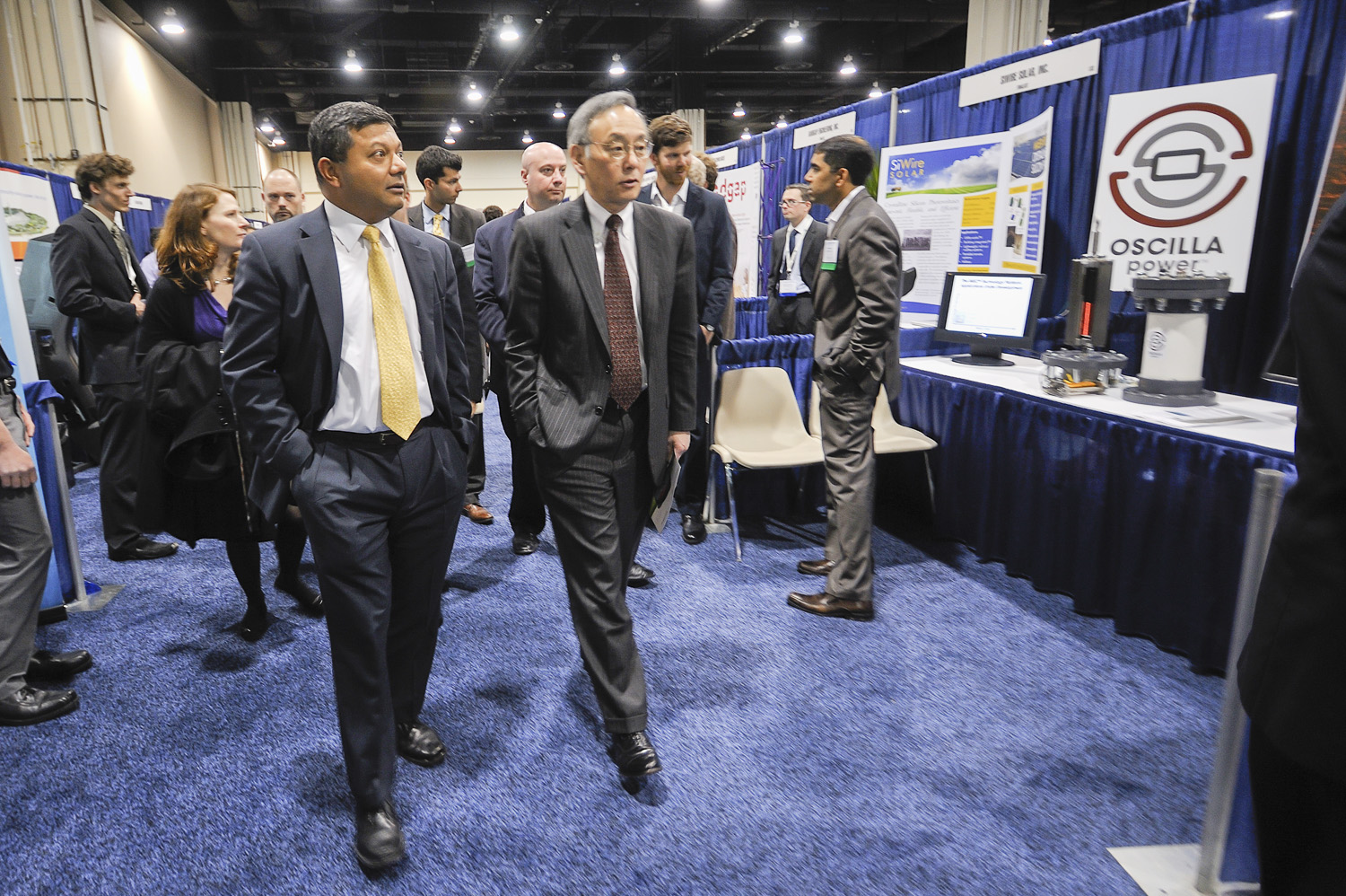 Former U.S. Secretary of Energy Steven Chu, right, and Arun Majumdar, former director of the Department of Energy’s Advanced Research Projects Agency-Energy, tour the agency’s Energy Innovation Summit in 2011. Now both members of the Stanford faculty, Chu and Majumdar are two of 11 experts interviewed for a new analysis of how the next boom in cleantech investments can be more productive than the first one. 