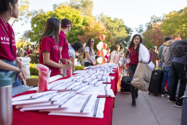 Lyndsey Kong brings her belongings into Roble Hall.