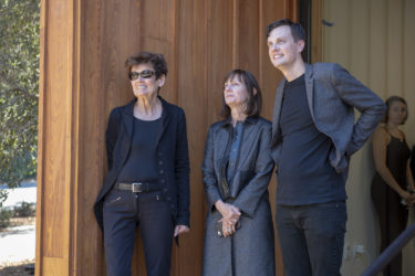 Artist Ursula von Rydingsvard, left, watches with Roberta and Robert Denning.