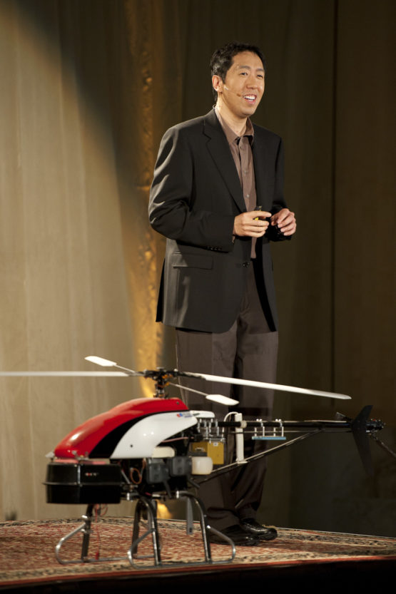 Ng on stage with one of his autonomous helicopters