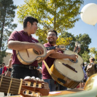 Eric Sosa-Lesso plays the vihuela and Joel Ramirez plays the guitarron