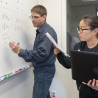 Professor Noah Rosenberg, left, and postdoc Jaehee Kim