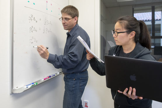 Professor Noah Rosenberg, left, and postdoc Jaehee Kim