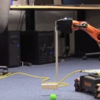 Robotic arm putting with a golf club