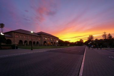 Sunset highlights the outside of the Main Quadrangle.