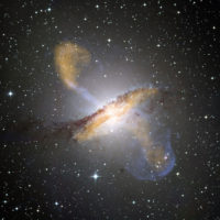 Composite image of the active galaxy Centaurus A, showing lobes and jets extending millions of light years into space.