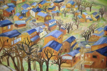 Bird's-eye view of homes with blue roofs and leafless trees