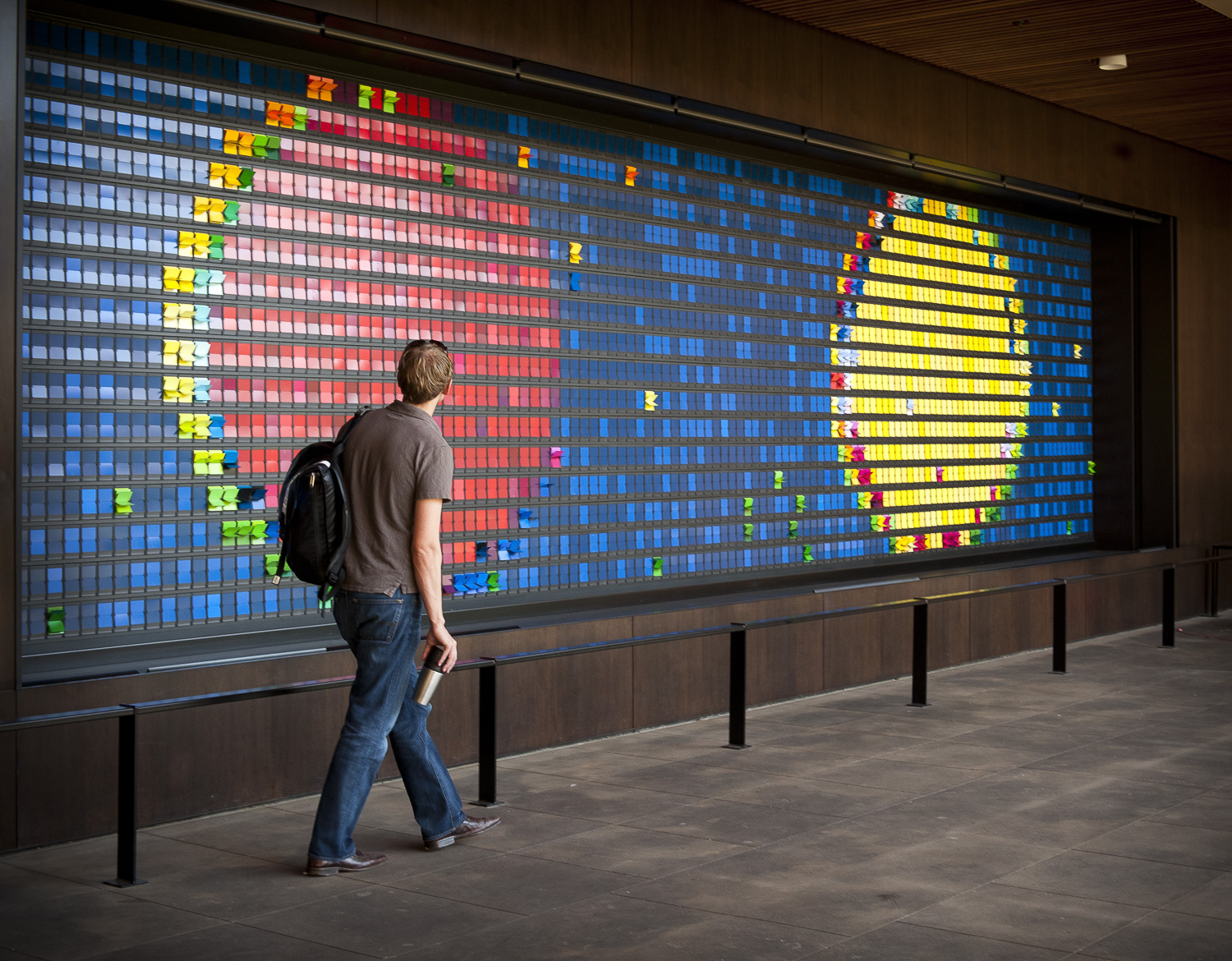 8/8/2011 Peter Wegner, ''Monument to Change as It Changes,'' 108 in. x 384 in., steel and polycarbonate, 2,048 flip digit modules each with 80 custom-printed colored flaps, permanently installed at the Knight Management Center, Stanford University, Palo Alto CA. Credit: Linda A. Cicero / Stanford News Service