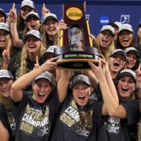 Stanford women's swimming and diving team with trophy