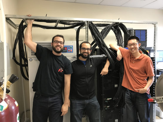 Stanford graduate students Nicholas Perkins, left, Peter Attia and Norman Jin