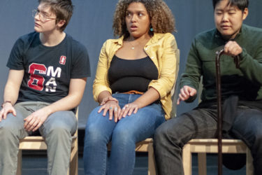 Actors Tyler Miller (Dorn), Sequoiah Hippolyte (Paulina) and Muse Lee (Sorin) in rehearsal.