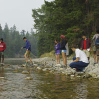 Students in the Cle Elum river