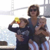 Zuckerman and kids pose by Golden Gate Bridge.